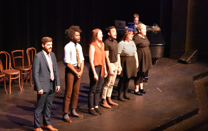 Second City performers on stage